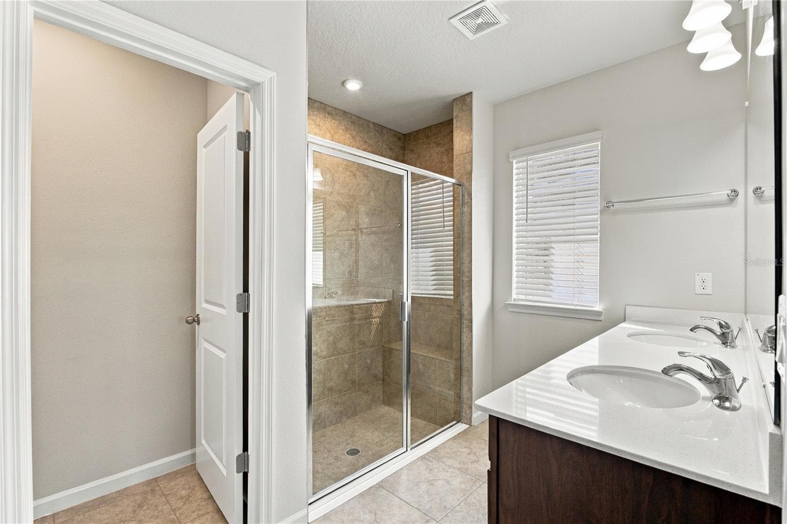 Primary Bath from Doorway Showing Private Toilet Room - 17973 DAIRY FARM CT, LAND O LAKES
