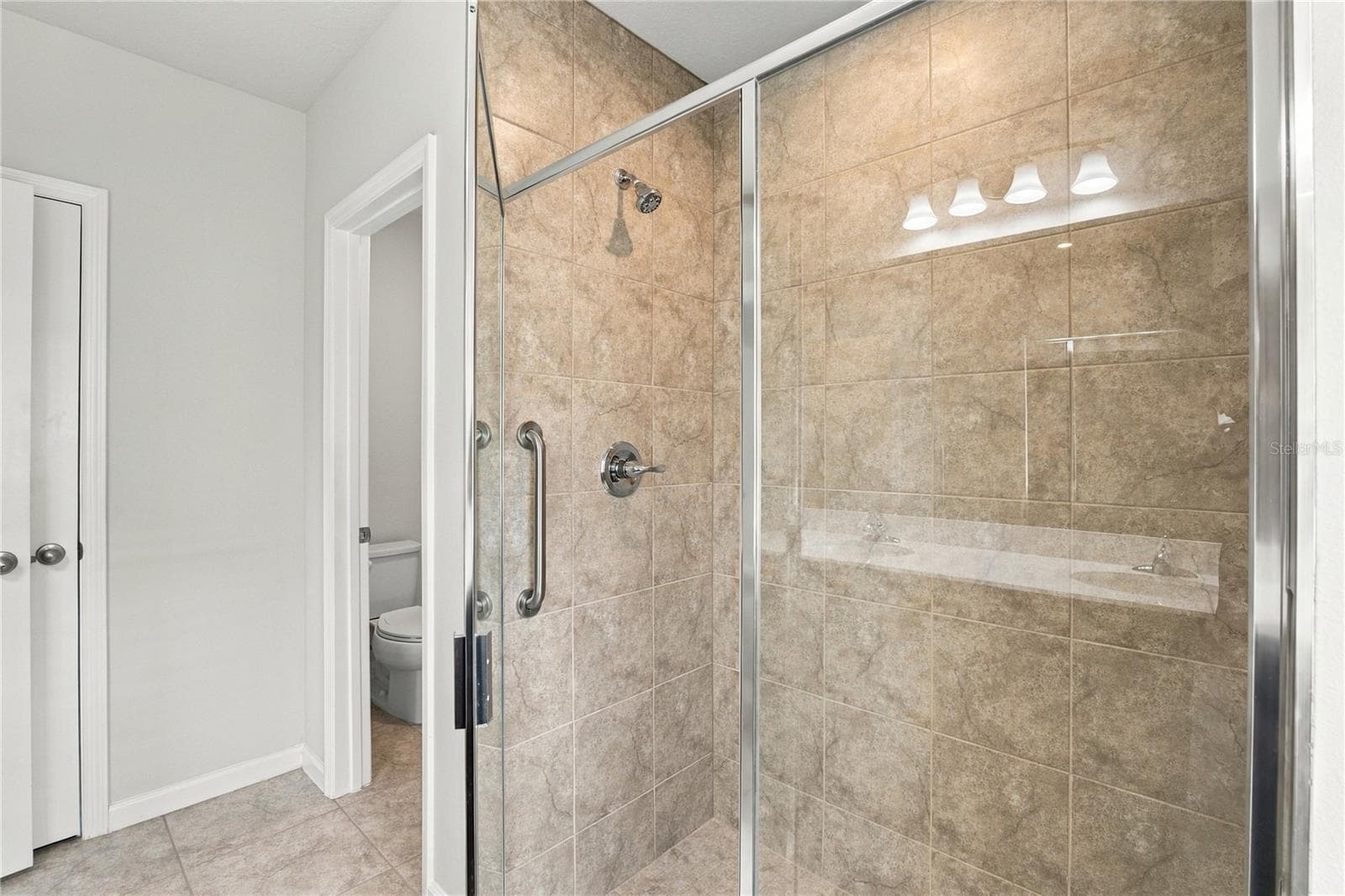 Primary Bathroom from Window View - 17973 DAIRY FARM CT, LAND O LAKES