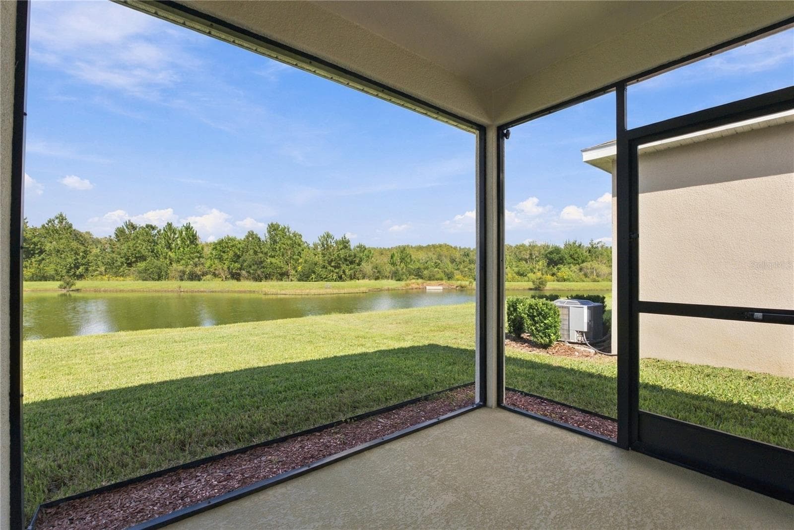 Screened Porch Area showing Screen Door - 17973 DAIRY FARM CT, LAND O LAKES
