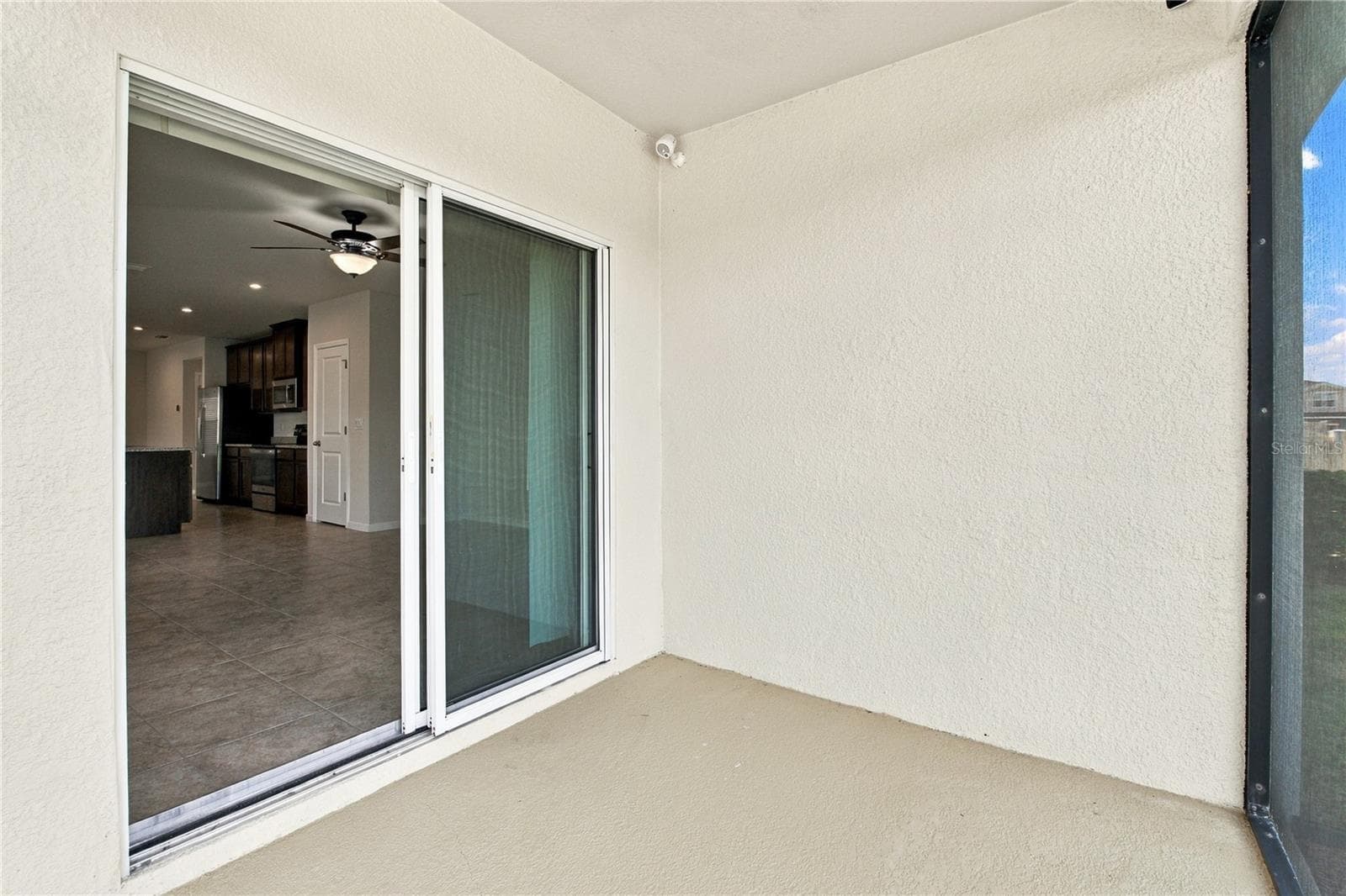 Screened Porch from Screen Door View - 17973 DAIRY FARM CT, LAND O LAKES