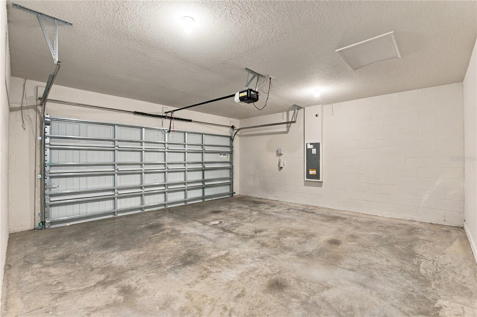 2 Car Garage View from Inside Doorway - 17973 DAIRY FARM CT, LAND O LAKES