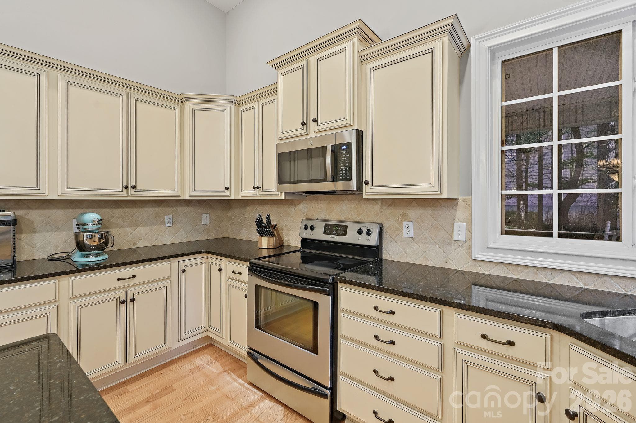 Offering granite counters and stainless steel appliances - 1491 Woodbend Court, Stanley