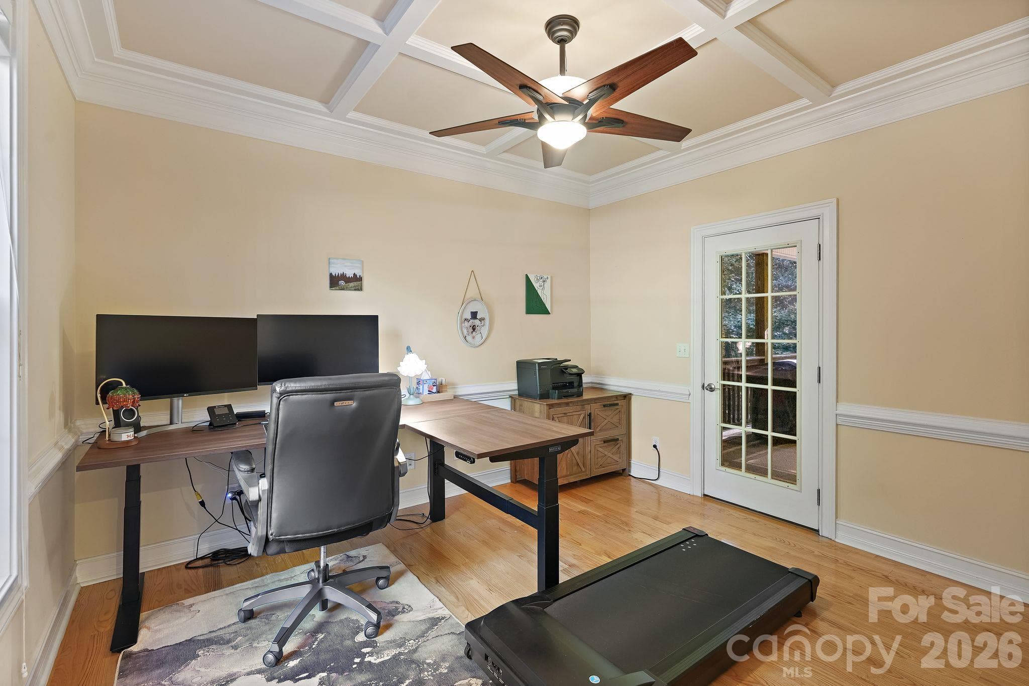 Dedicated main-level office with coffered ceilings leads to screened porch - 1491 Woodbend Court, Stanley