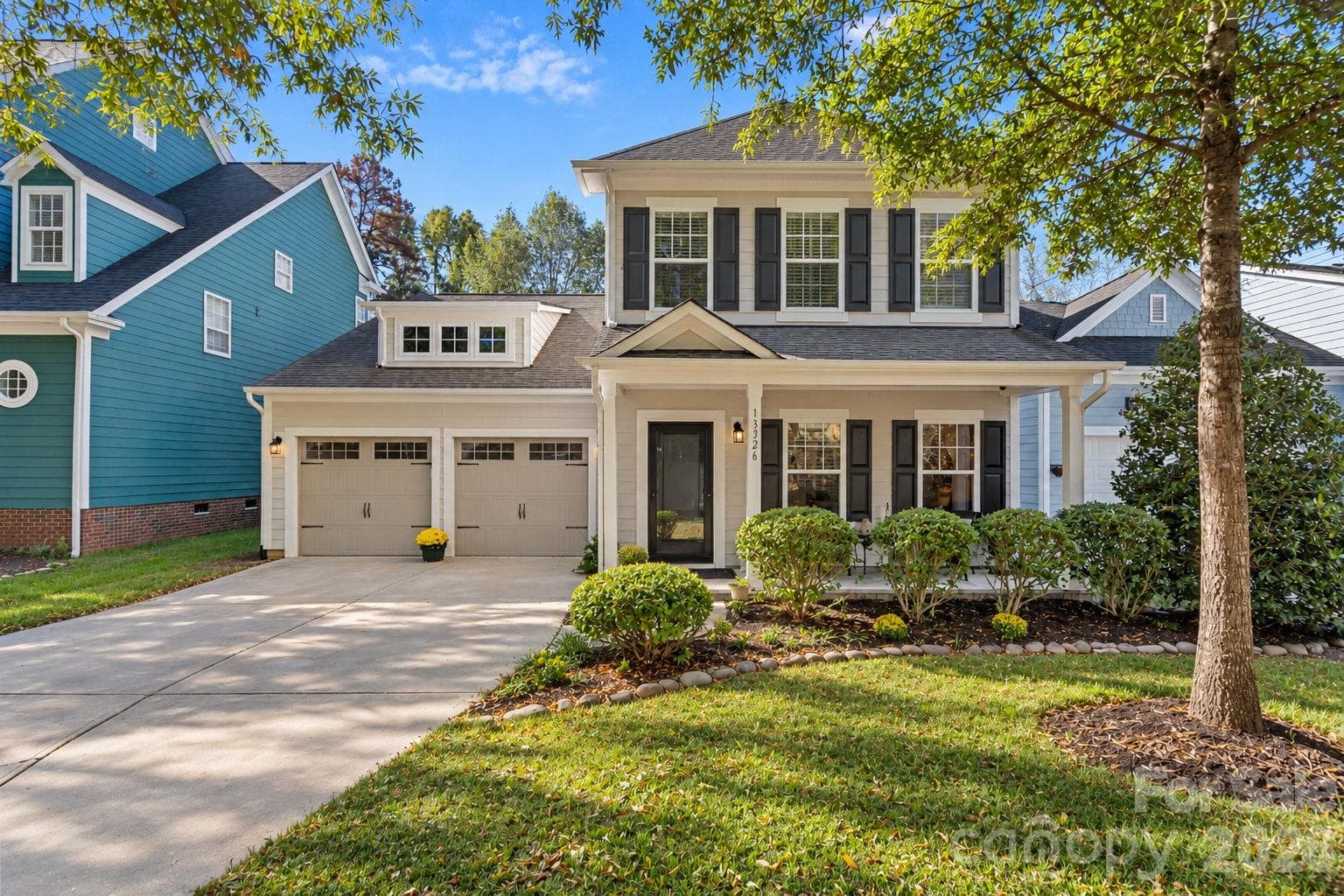 Beautiful 4 bedroom home with covered front porch and private, fenced backyard - 13326 Pierre Reverdy Drive, Davidson