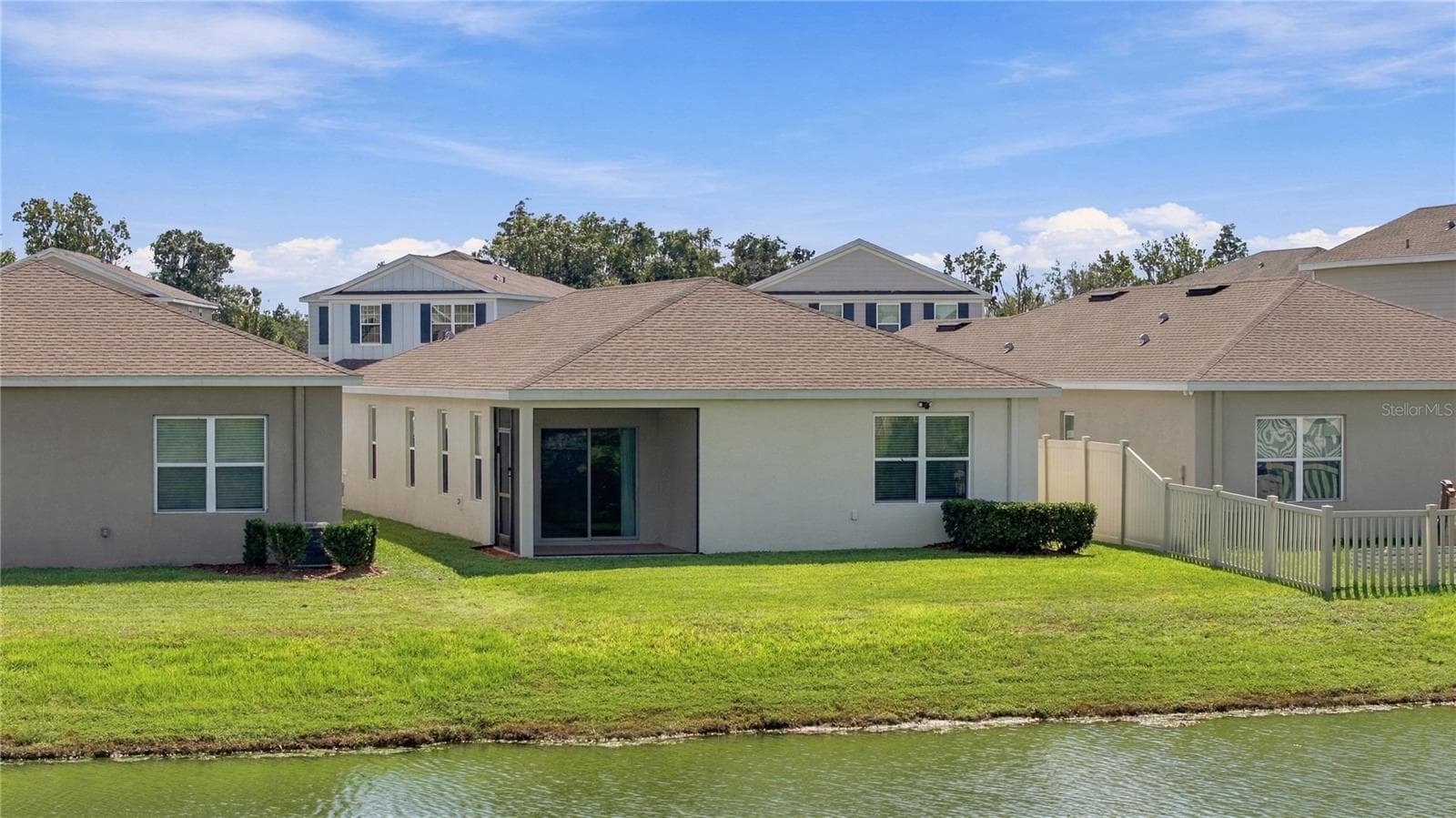 Home Perspective from middle of Lake - 17973 DAIRY FARM CT, LAND O LAKES
