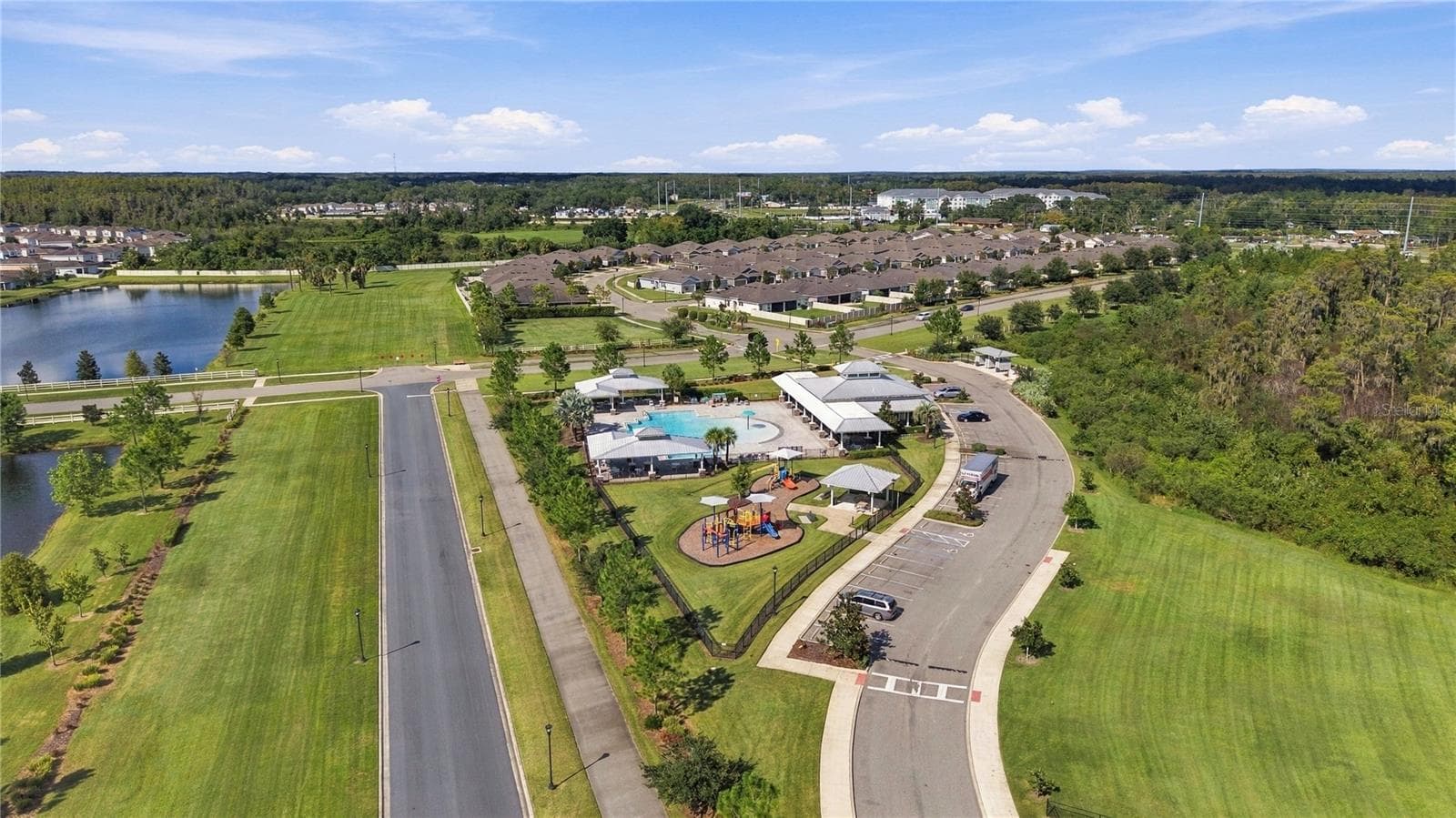Drone View of Community Pool Area and Playground - 17973 DAIRY FARM CT, LAND O LAKES