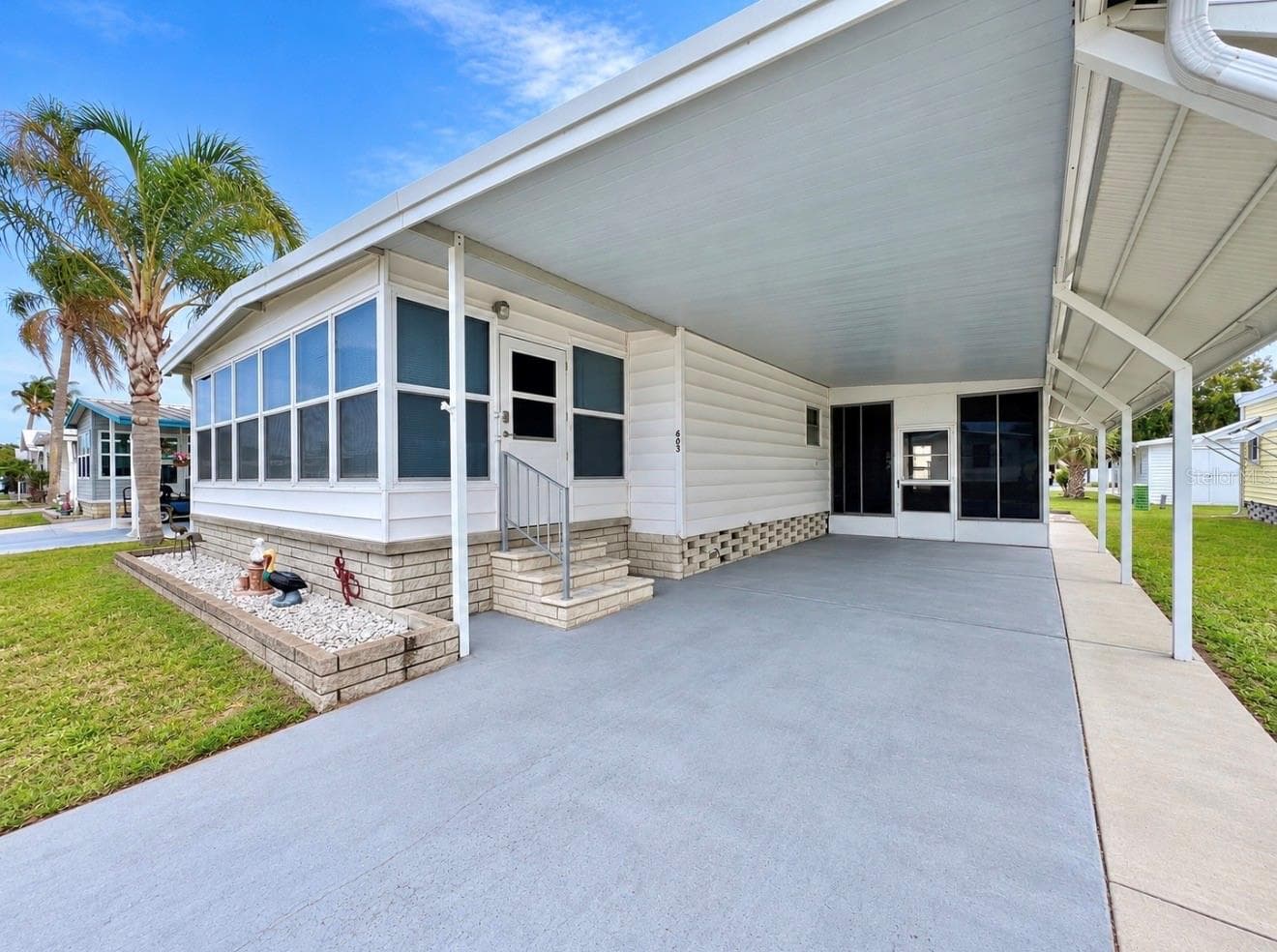 NWfront corner and driveway - 1100 BELCHER RD S #663, LARGO