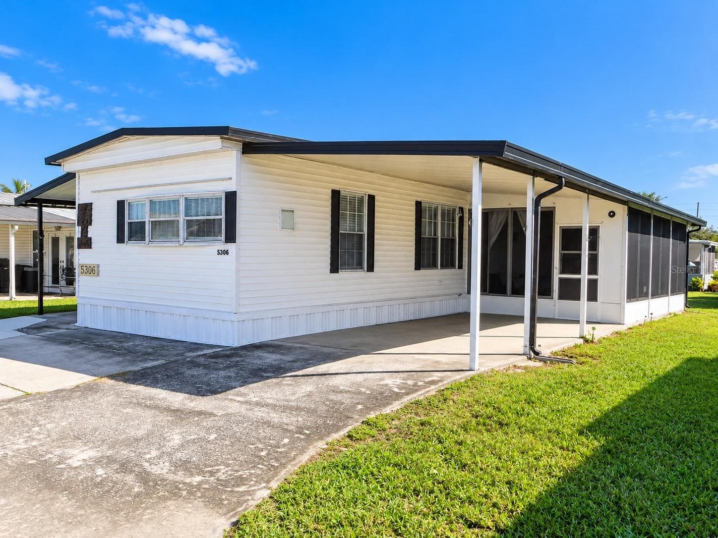 Manufactured Home at 5306 ASTRID DR, ZEPHYRHILLS, photo 3 of 39