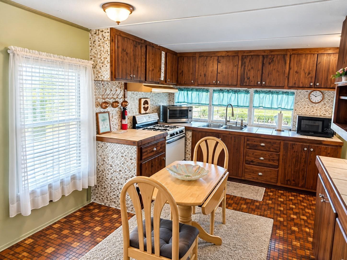 Kitchen area. - 5306 ASTRID DR, ZEPHYRHILLS