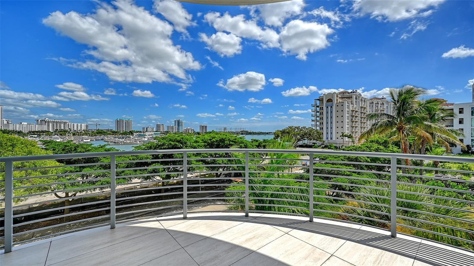 Front wrap around lanai - 609 GOLDEN GATE PT #301, SARASOTA