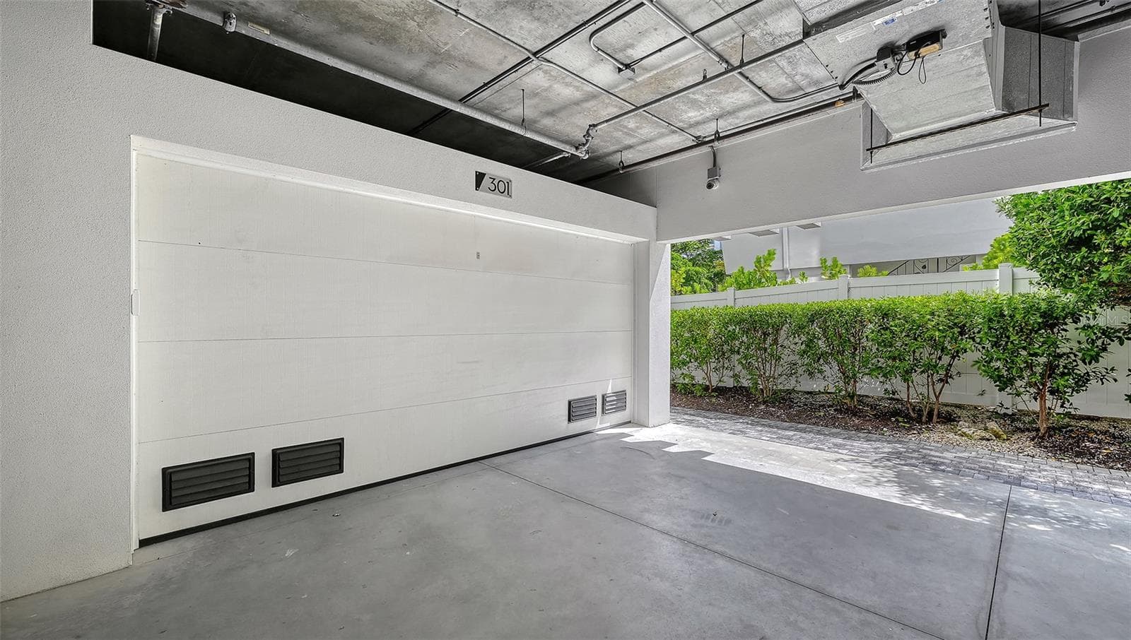 Under building 2 car garage for unit 301 - 609 GOLDEN GATE PT #301, SARASOTA
