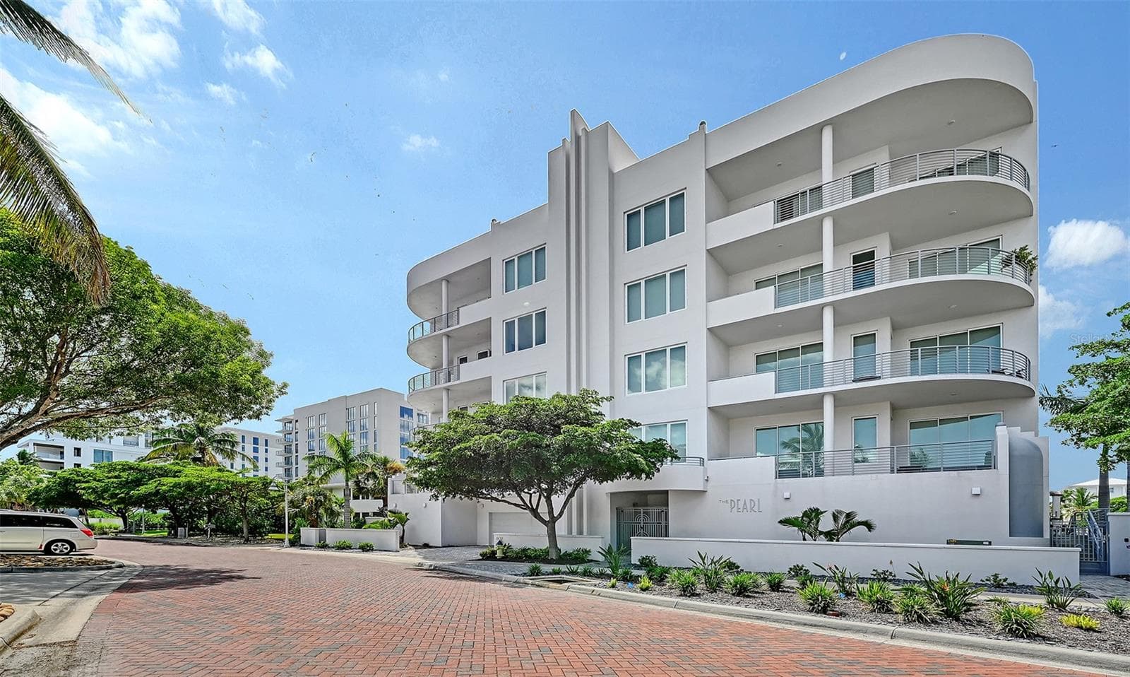 Brick Paver Street and front photo of The Pearl - 609 GOLDEN GATE PT #301, SARASOTA