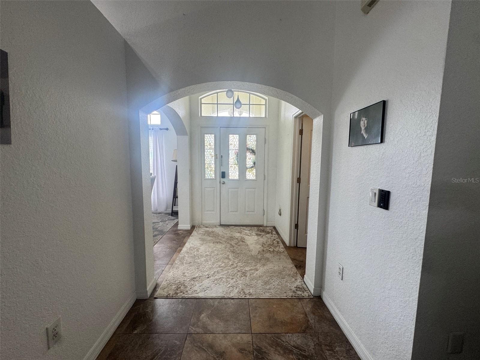 View towards entry from Living Room - 4470 SW 132 PL, OCALA
