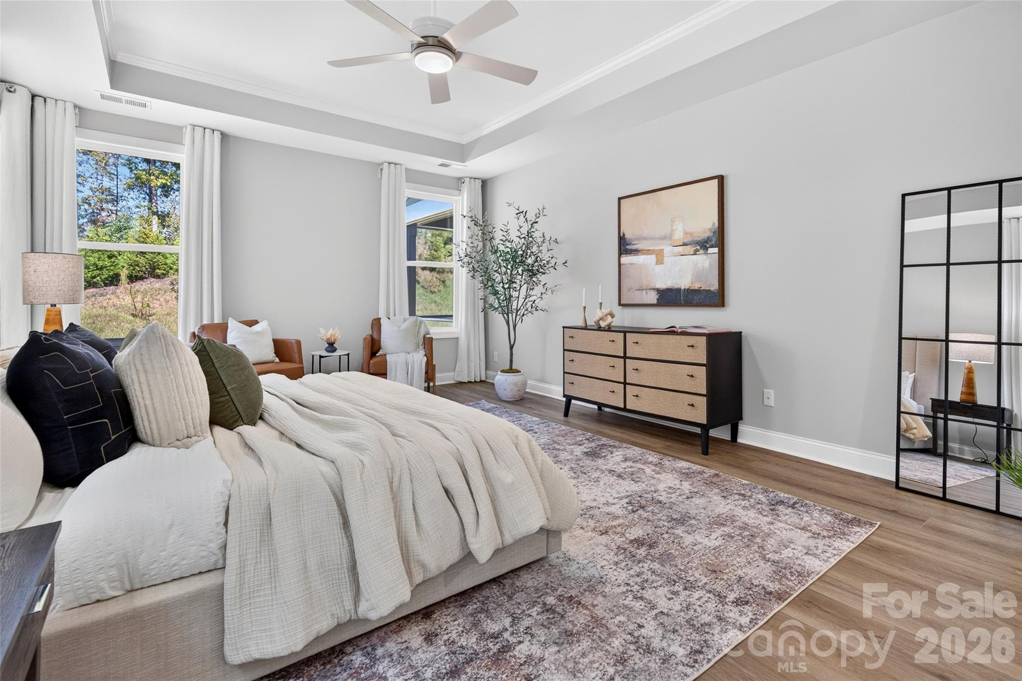 Primary Suite with neutral paint, tray ceiling, and low maintenance vinyl flooring - 13413 Cozy Court, Charlotte