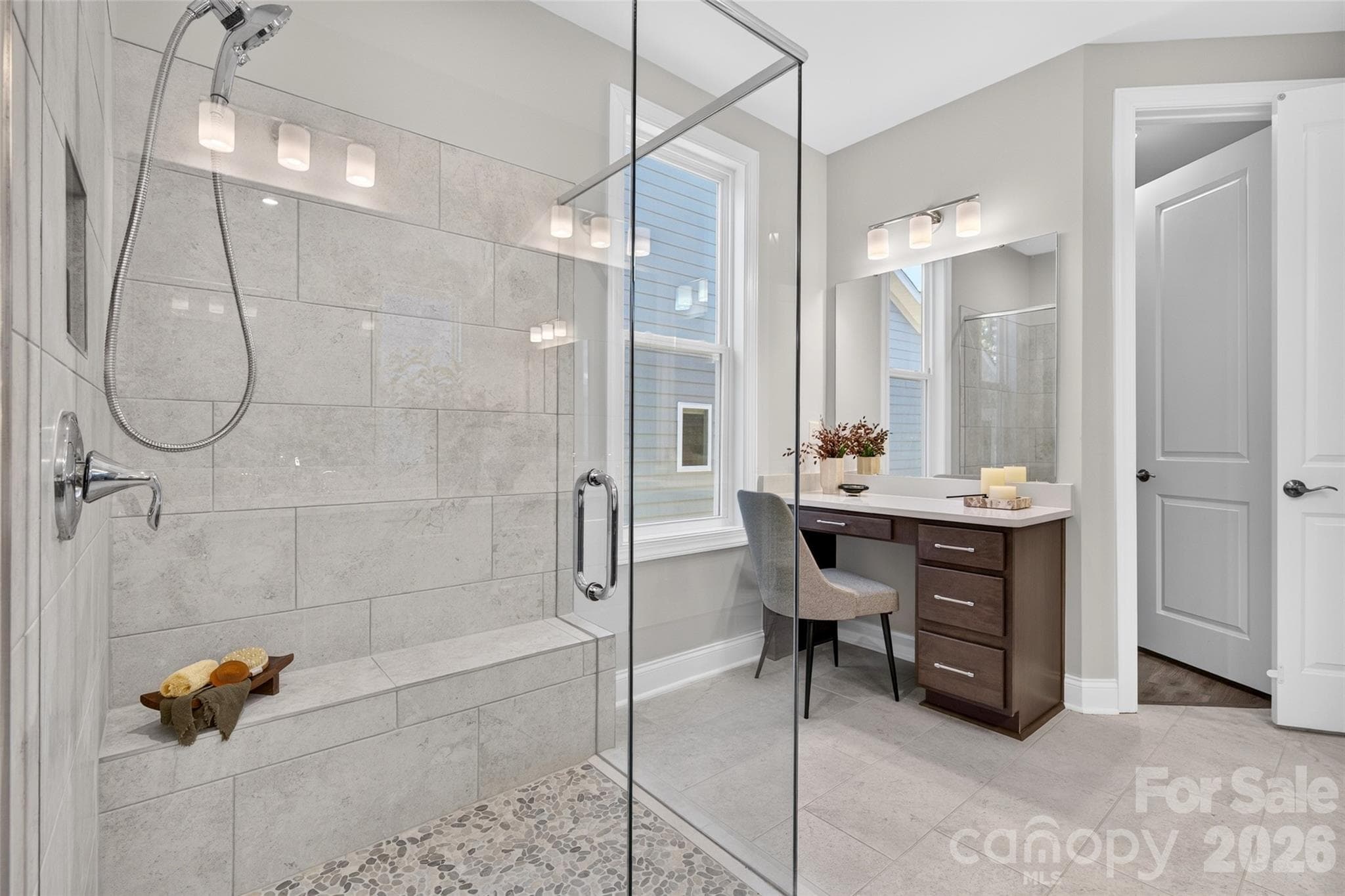 Separate makeup vanity with quartz counter in Primary ensuite bath - 13413 Cozy Court, Charlotte