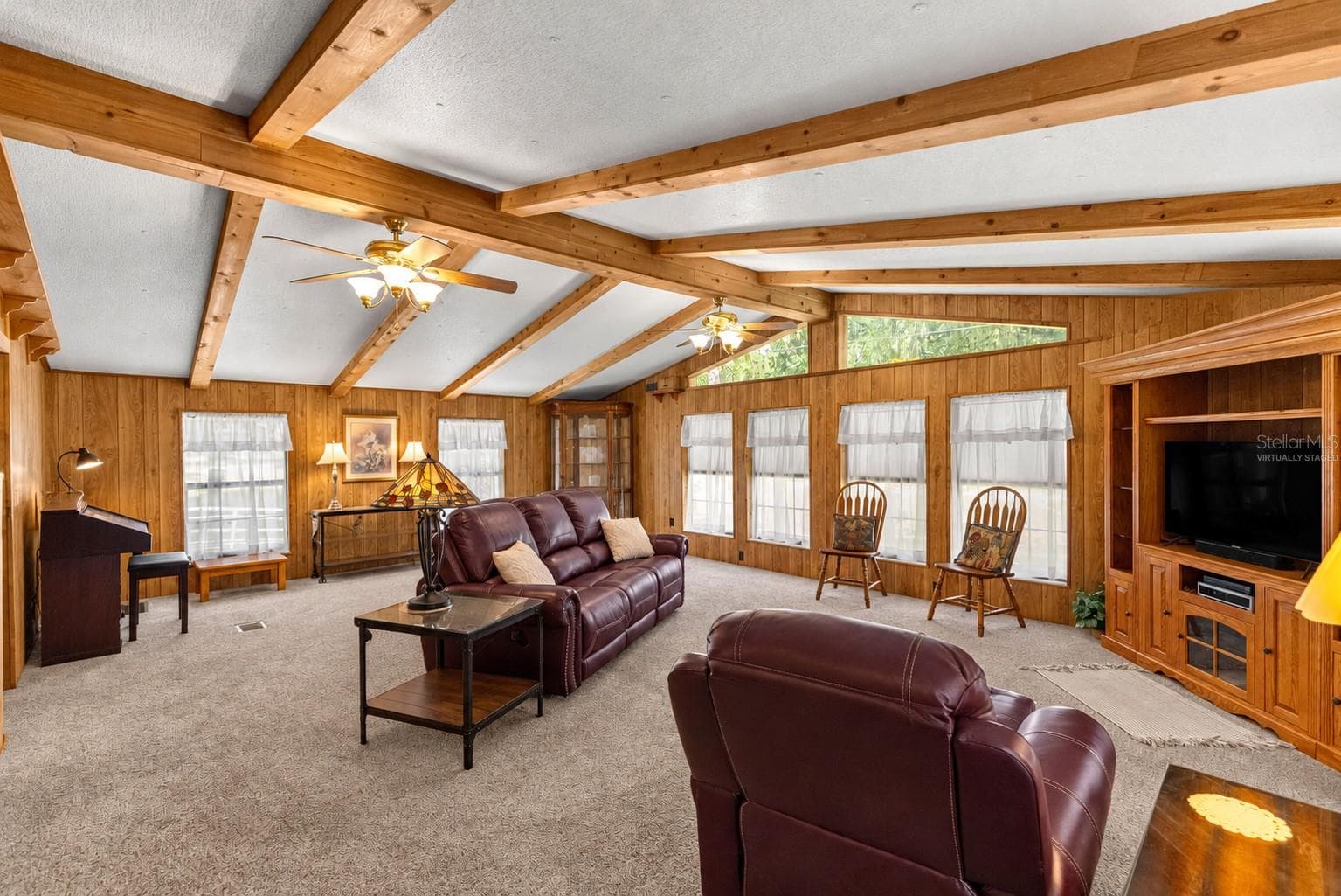 #1 · Living area and adjoining rooms. Virtually staged—personal items digitally removed. - 7434 E CABIN LN, INVERNESS