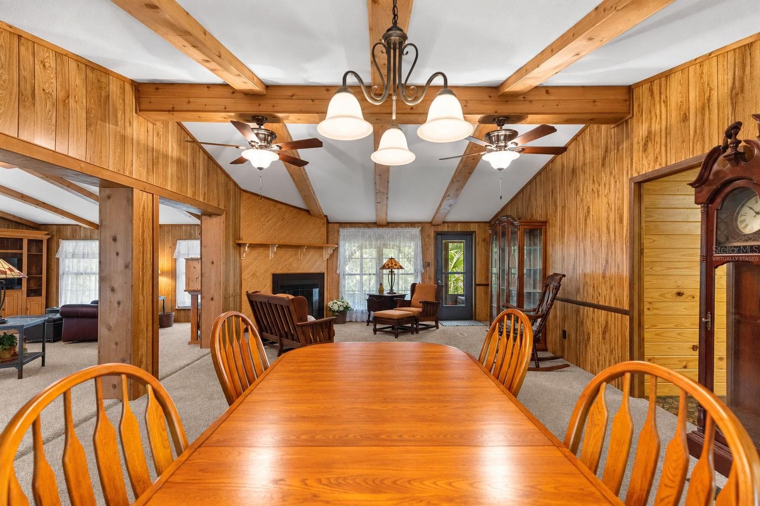 #1 · Dining area beside the kitchen. Virtually staged—personal items digitally removed. - 7434 E CABIN LN, INVERNESS