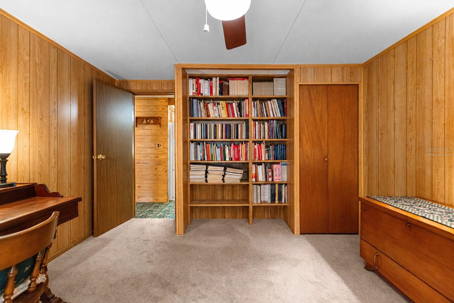 #1 · Bedroom three, reverse view. Virtually staged—personal items digitally removed. - 7434 E CABIN LN, INVERNESS