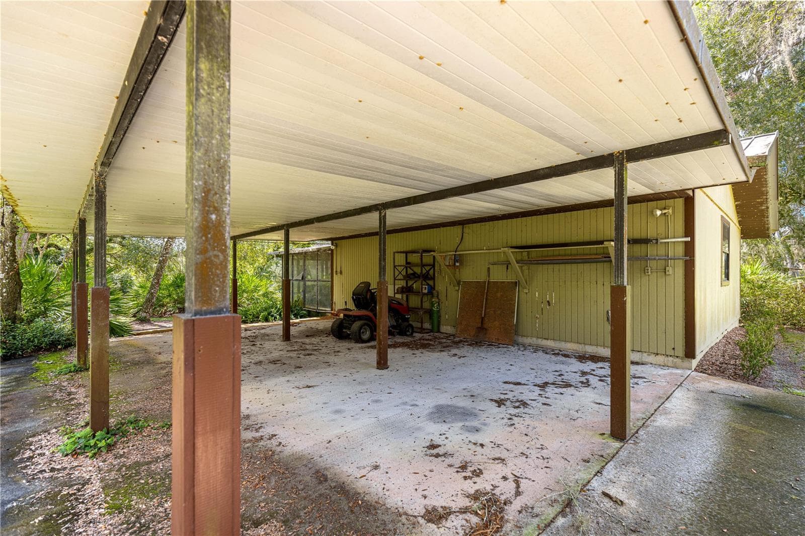 #3 · Covered parking beside the woodworking shop. - 7434 E CABIN LN, INVERNESS