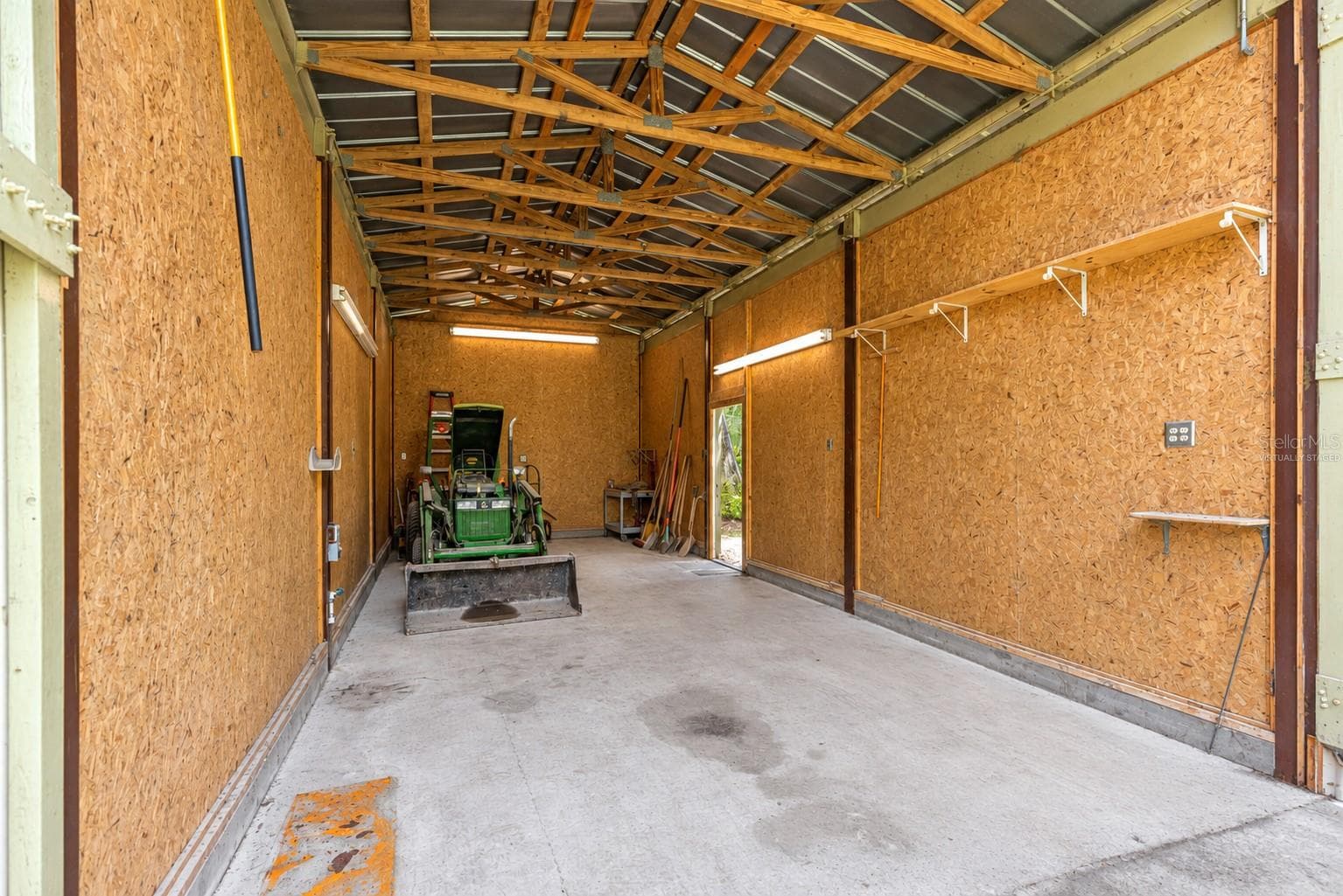 #4 · RV/toy storage interior. Virtually staged—personal items digitally removed. - 7434 E CABIN LN, INVERNESS
