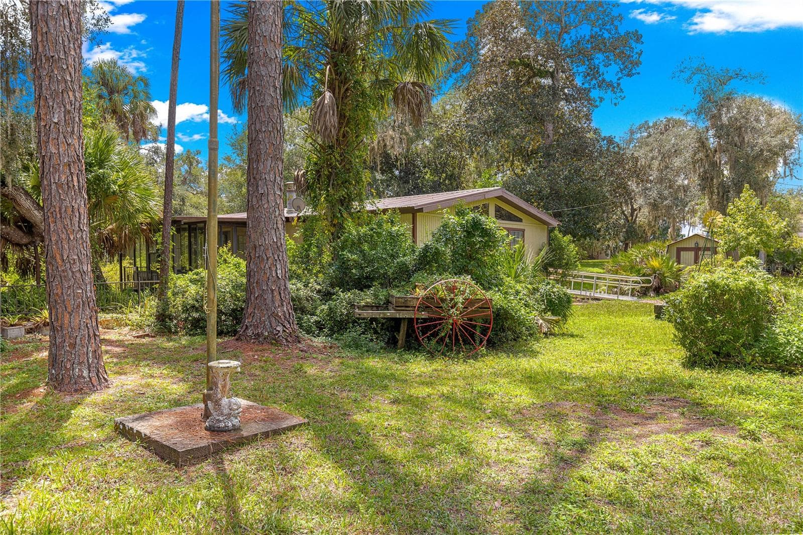 #1 · Main residence within its landscaped setting. - 7434 E CABIN LN, INVERNESS