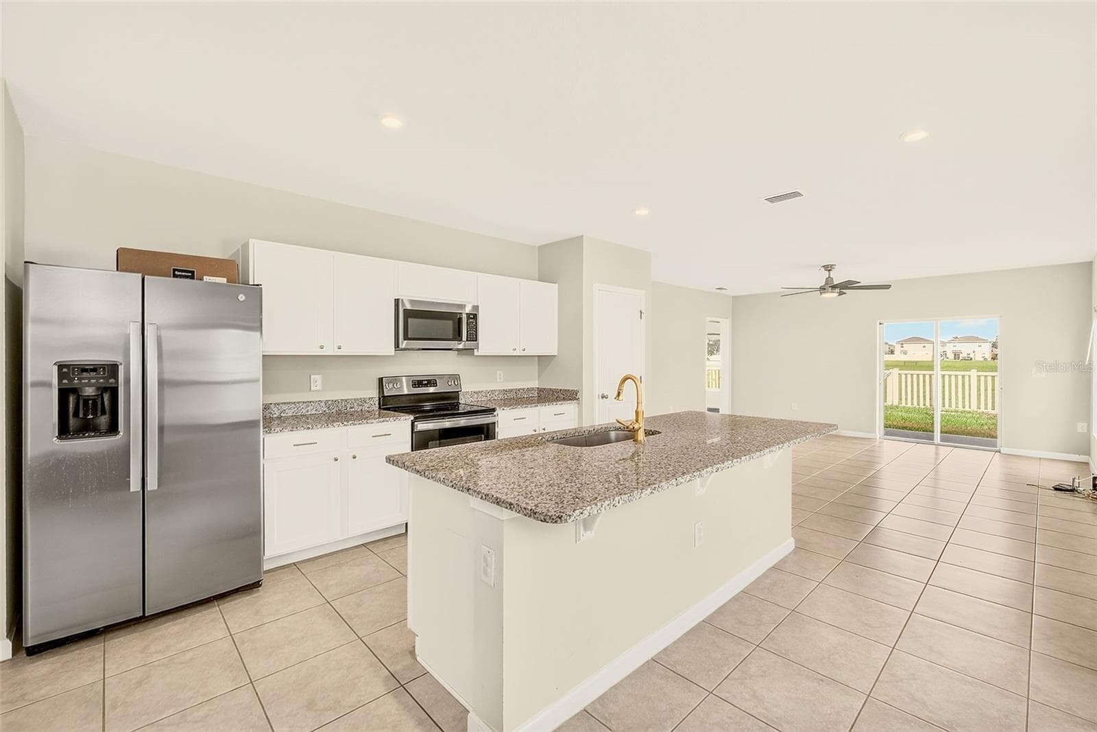 KITCHEN AND ISLAND - 35235 GENDRY ST, ZEPHYRHILLS