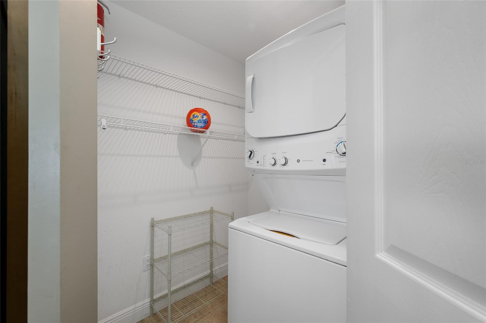 Laundry/Storage Room with Stack Washer and Dryer. - 16700 GULF BLVD #524, NORTH REDINGTON BEACH