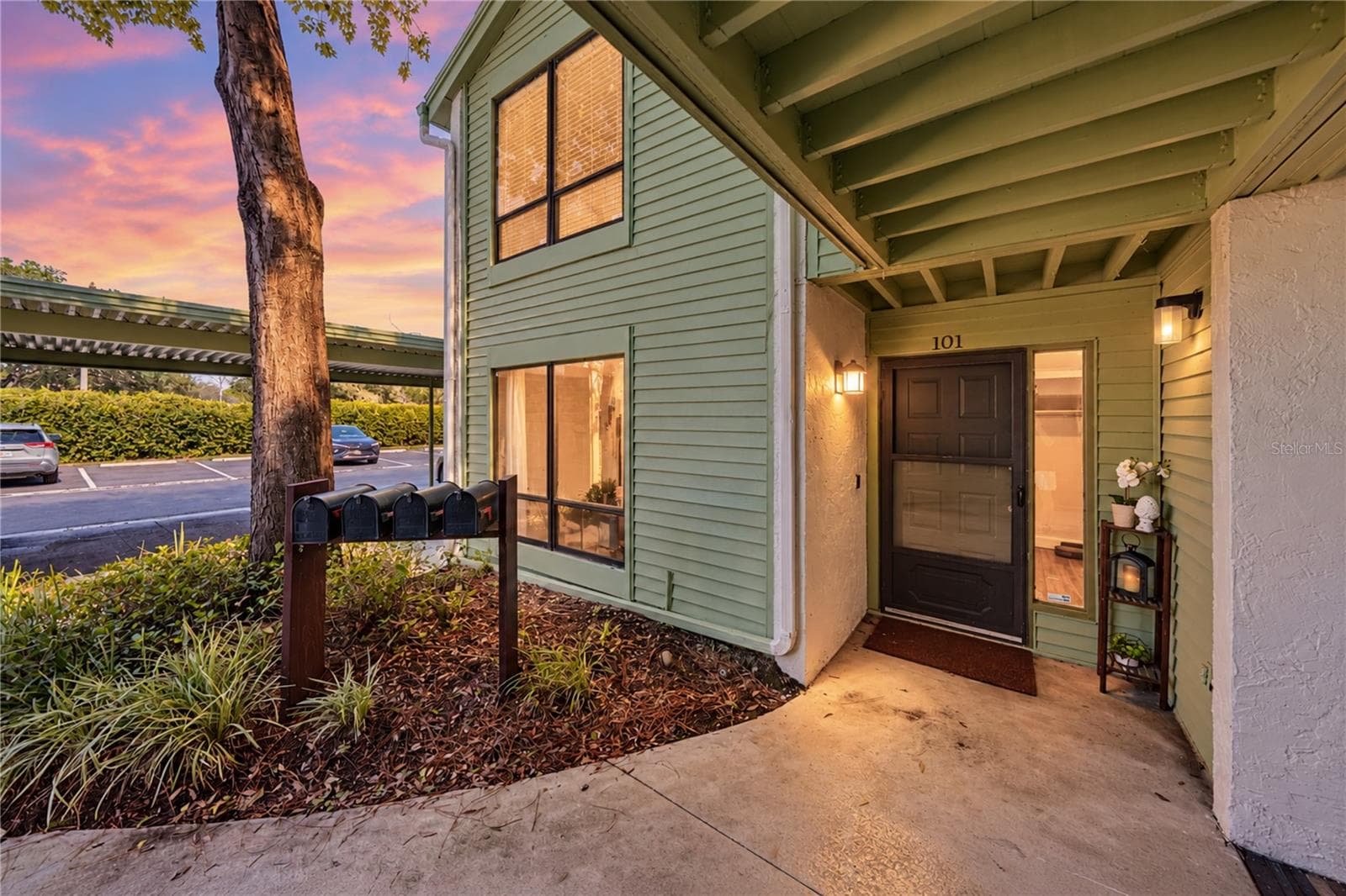Exterior Front Night Shot in Beautifully Maintained Carrollwood - 4106 PINELAKE LN #101, TAMPA