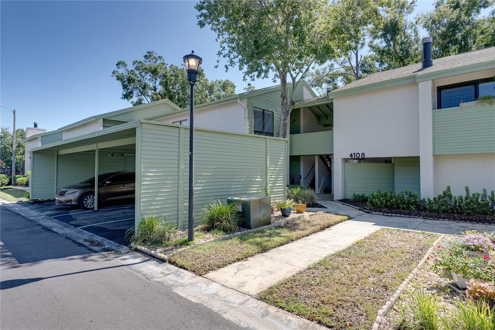 Exterior Front Beautifully Maintained Carrollwood Village! - 4106 PINELAKE LN #101, TAMPA