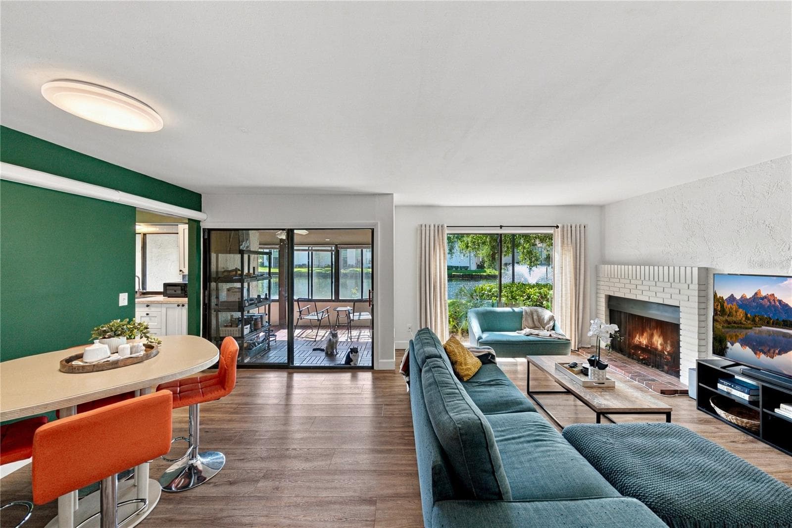 Charming Living Room Area with Beautiful Wood Burning Fireplace - 4106 PINELAKE LN #101, TAMPA