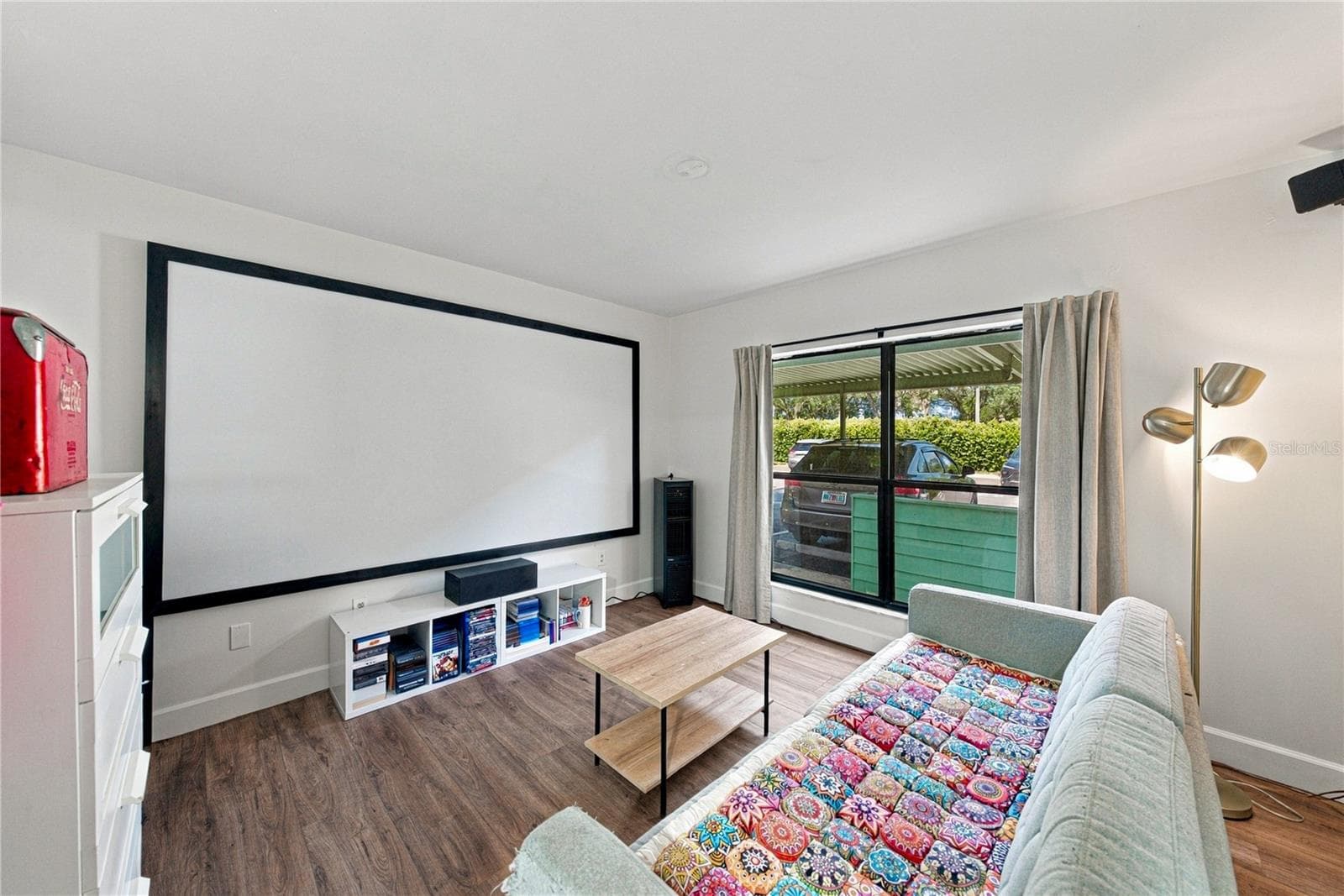 Second Bedroom used as a Movie Room with Plank Flooring and Large Closet - 4106 PINELAKE LN #101, TAMPA