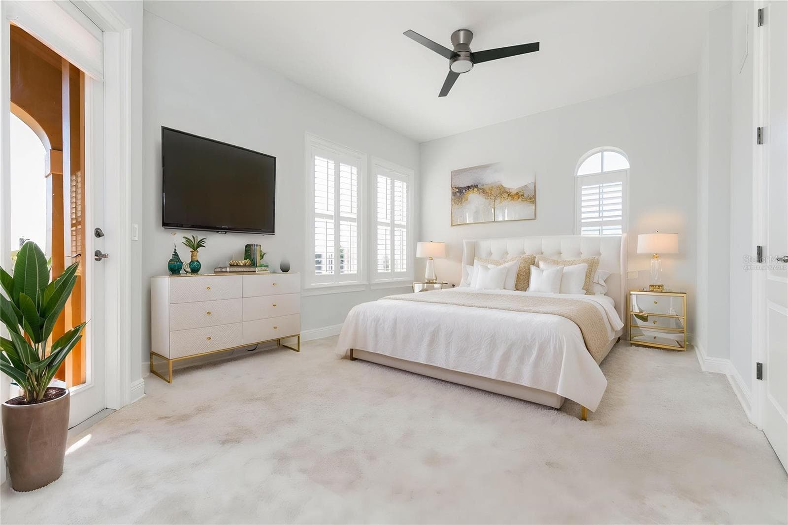 Virtually staged; primary bedroom with balcony. - 114 E DAVIS BLVD #13, TAMPA