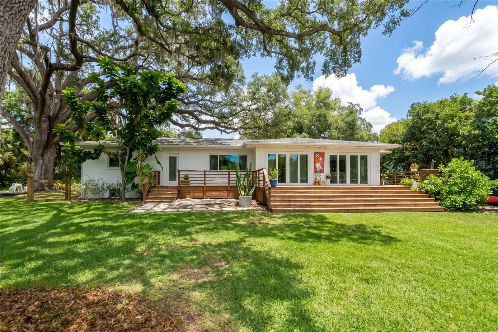 An expansive back patio to relax or entertain - 7308 N OLA AVE, TAMPA
