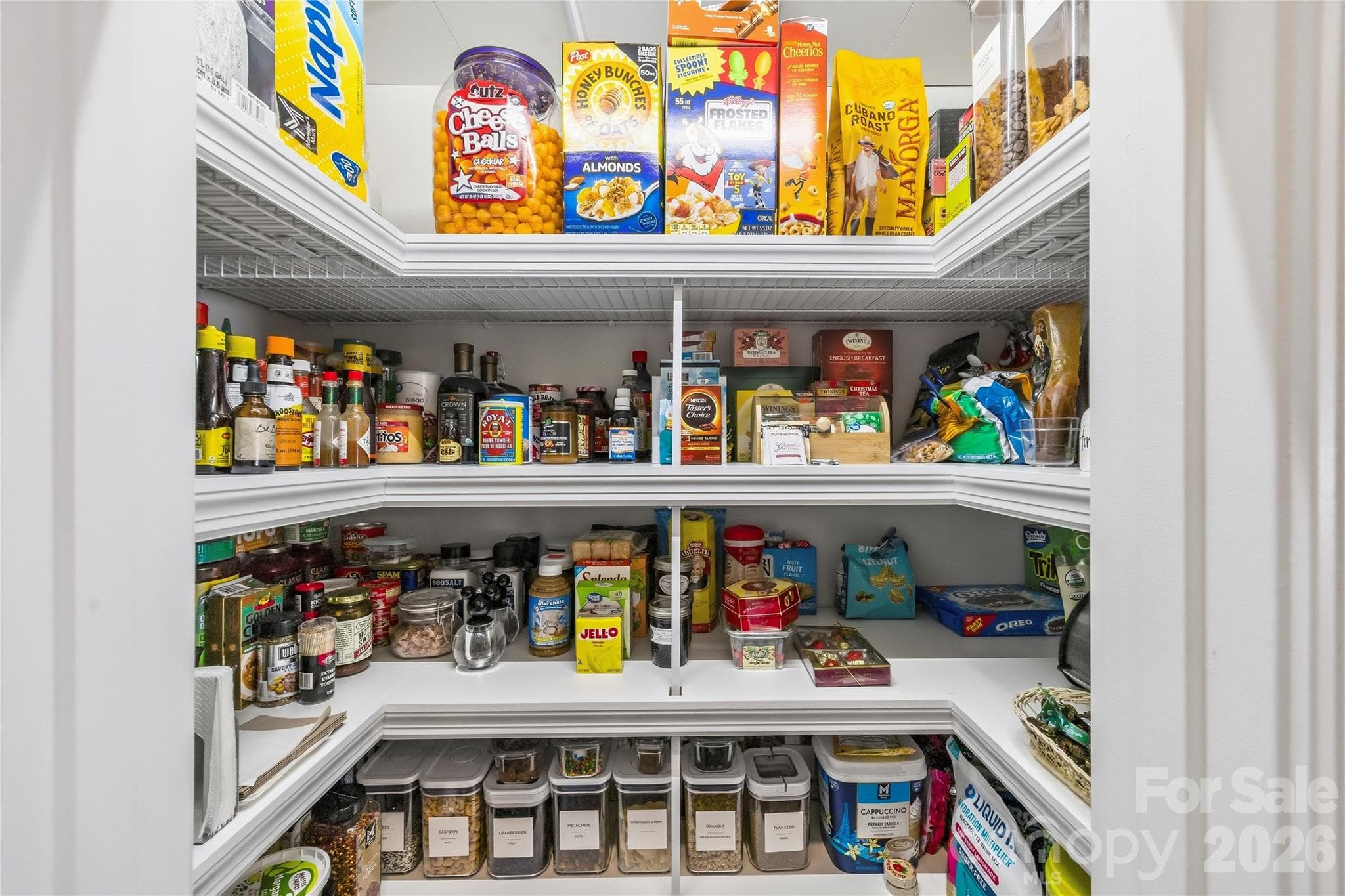 Walk in pantry with wood overlay shelving. - 9022 Poquoson Drive, Gastonia