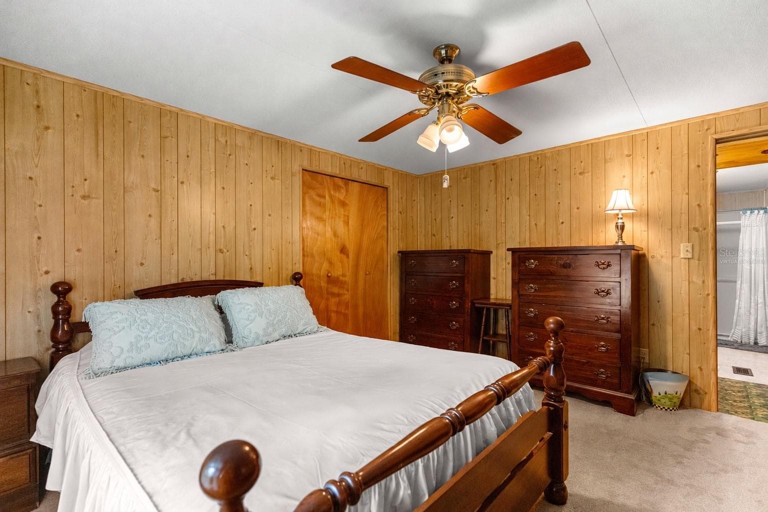 #1 · Bedroom two, reverse view. Virtually staged—personal items digitally removed. - 7434 E CABIN LN, INVERNESS