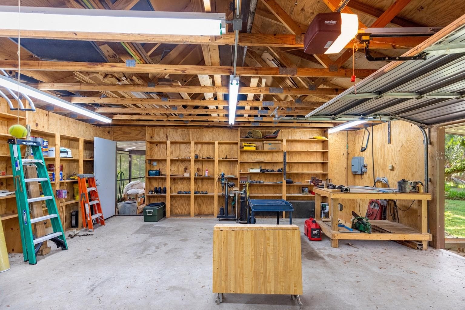 #3 · Woodworking shop reverse view. Virtually staged—personal items digitally removed. - 7434 E CABIN LN, INVERNESS