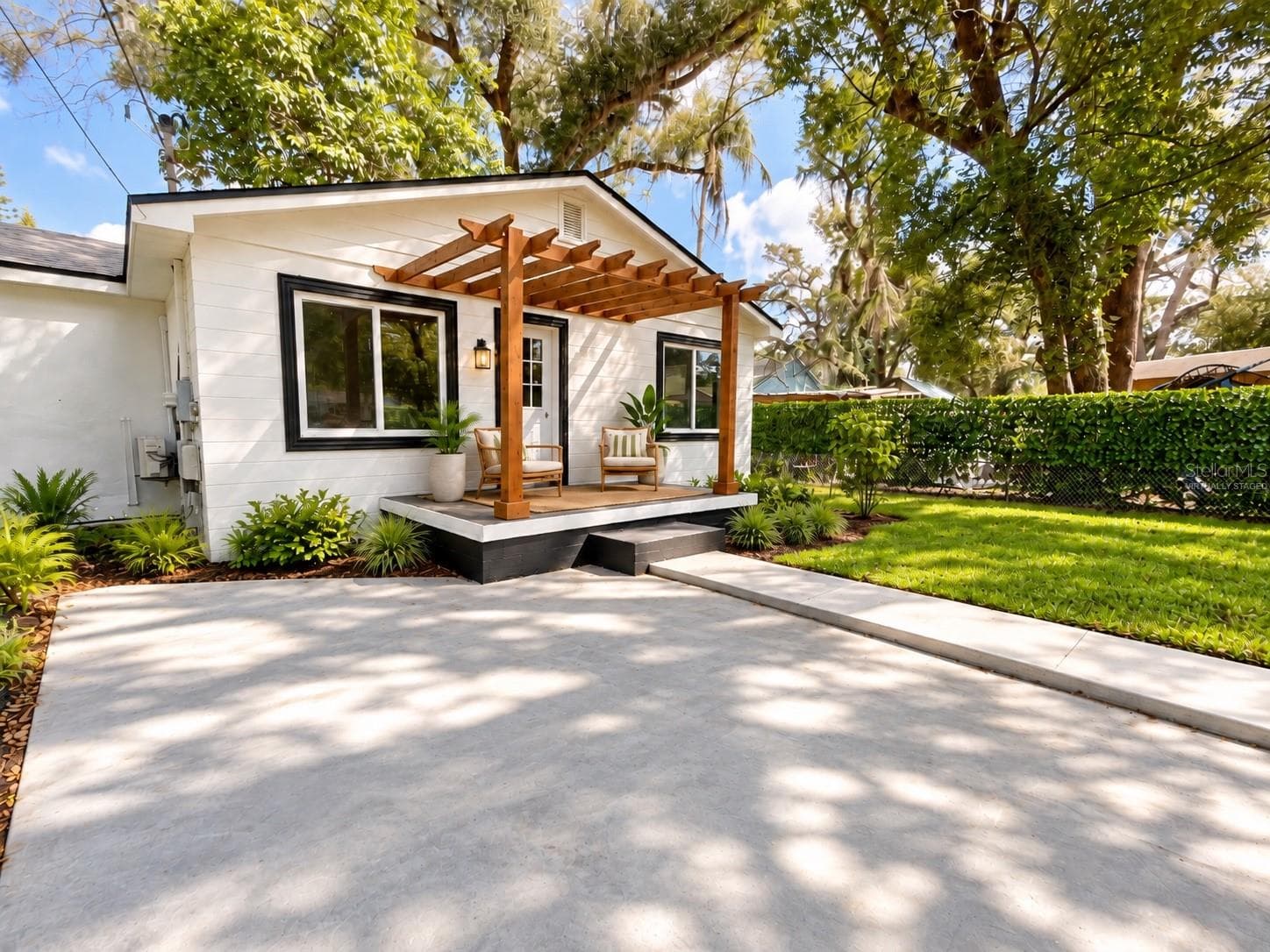 Virtually Staged_Angled Front Exterior - 2102 E CARACAS ST, TAMPA