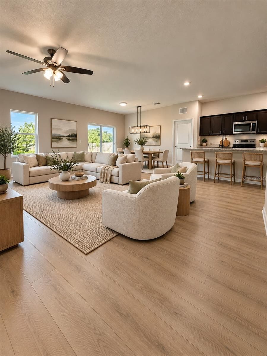 Virtual Stage Photo Living, Dining and Kitchen furniture and lighting fixtures. - 1261 ANCHOR BEND DR, RUSKIN
