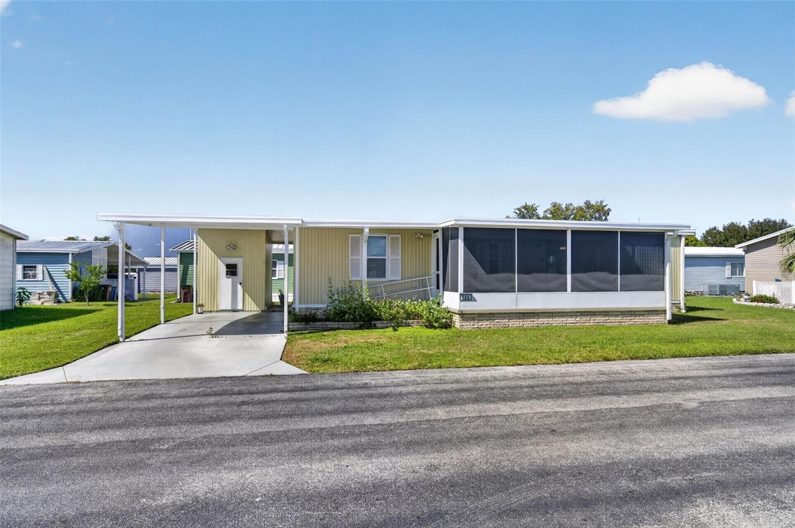 Manufactured Home at 2055 S FLORAL AVE #284, BARTOW, photo 2 of 45