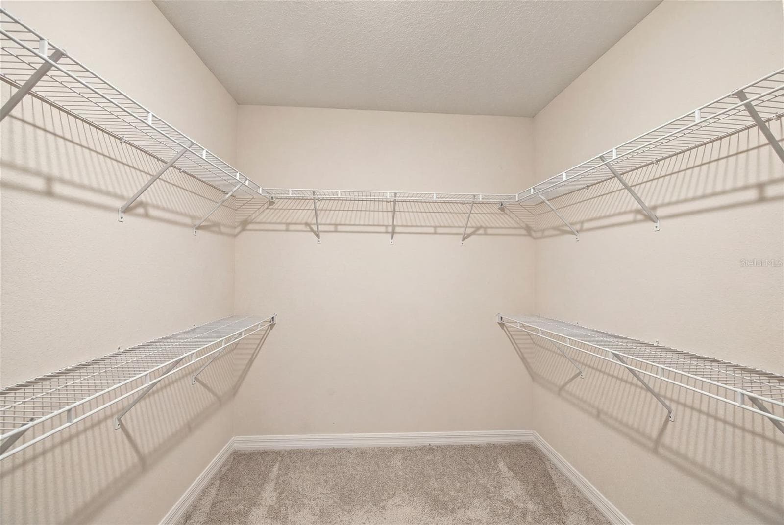 Primary walk in closet - 16739 SUNBURST LAKE ST, WIMAUMA