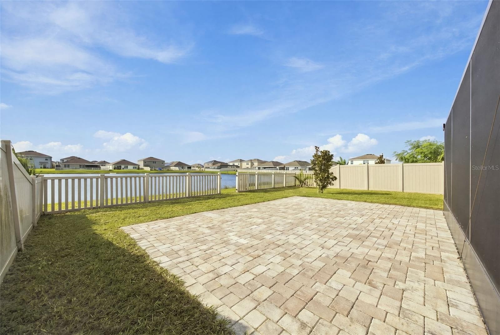Backyard patio - 16739 SUNBURST LAKE ST, WIMAUMA