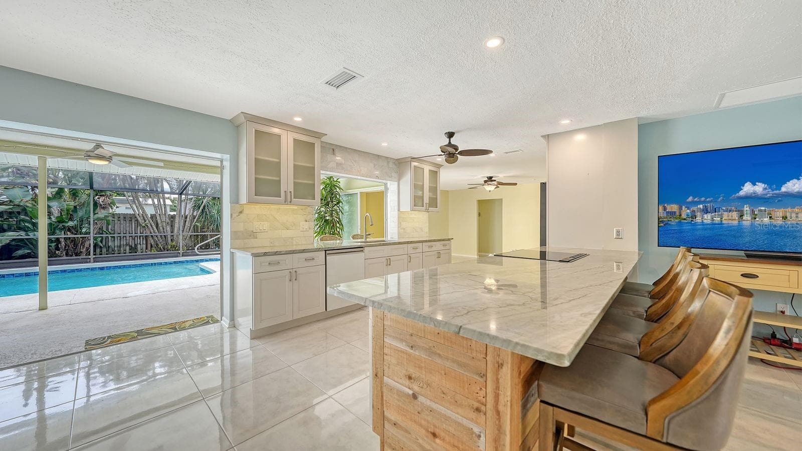 Sliders open onto the Lanai which makes this a great home for entertaining! - 2295 PINE VIEW CIR, SARASOTA