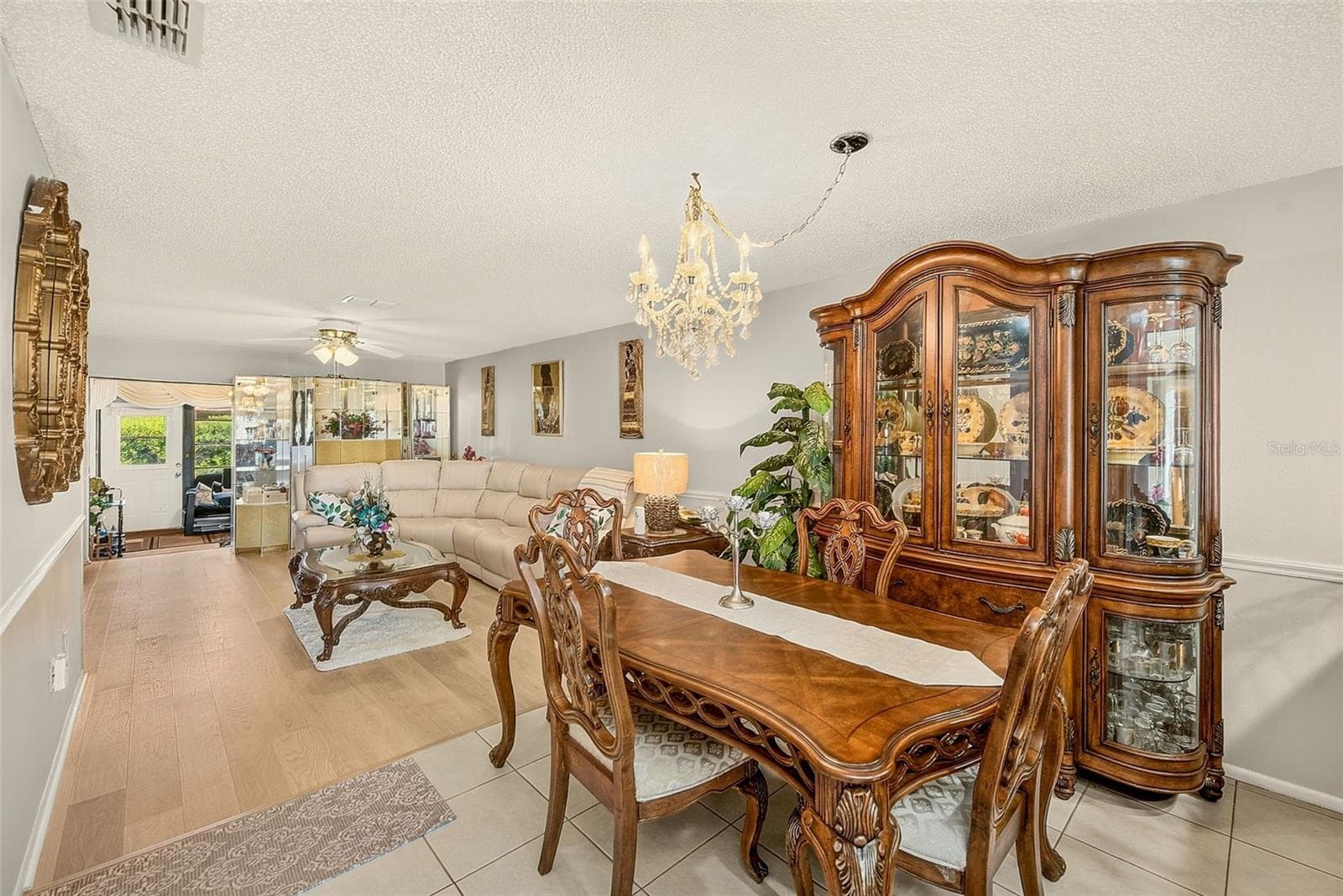 View of dining room and living room and bonus room - 19029 US HIGHWAY 19 N #21F, CLEARWATER