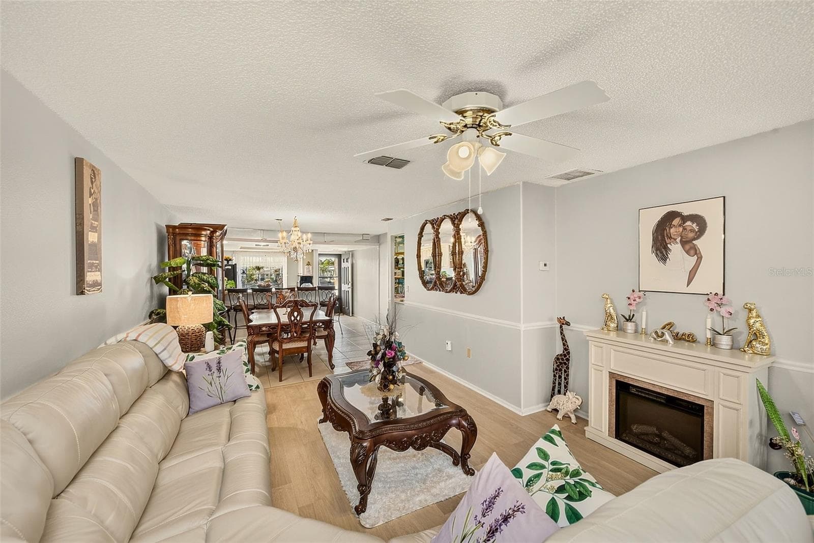 View of living room, dining room and kitchen - 19029 US HIGHWAY 19 N #21F, CLEARWATER