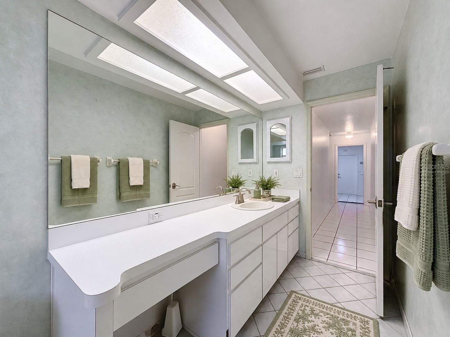 Hall bathroom is large with lots of storage. (virtually staged) - 10074 SLEEPY WILLOW CT, SPRING HILL
