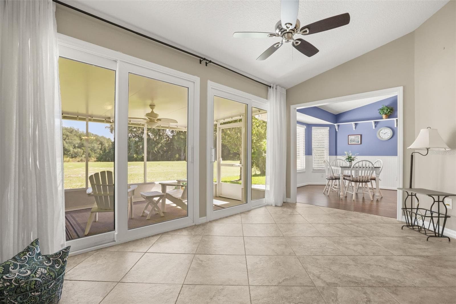 Lanai with golf course views... - 4704 RIVER RIDGE DR, LEESBURG
