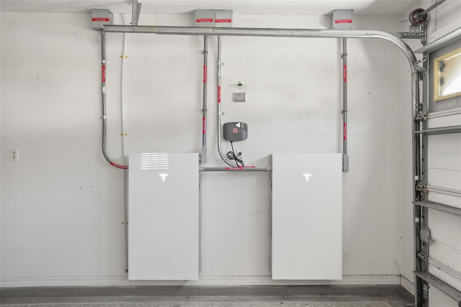 Tesla wall for solar battery storage - 4704 RIVER RIDGE DR, LEESBURG