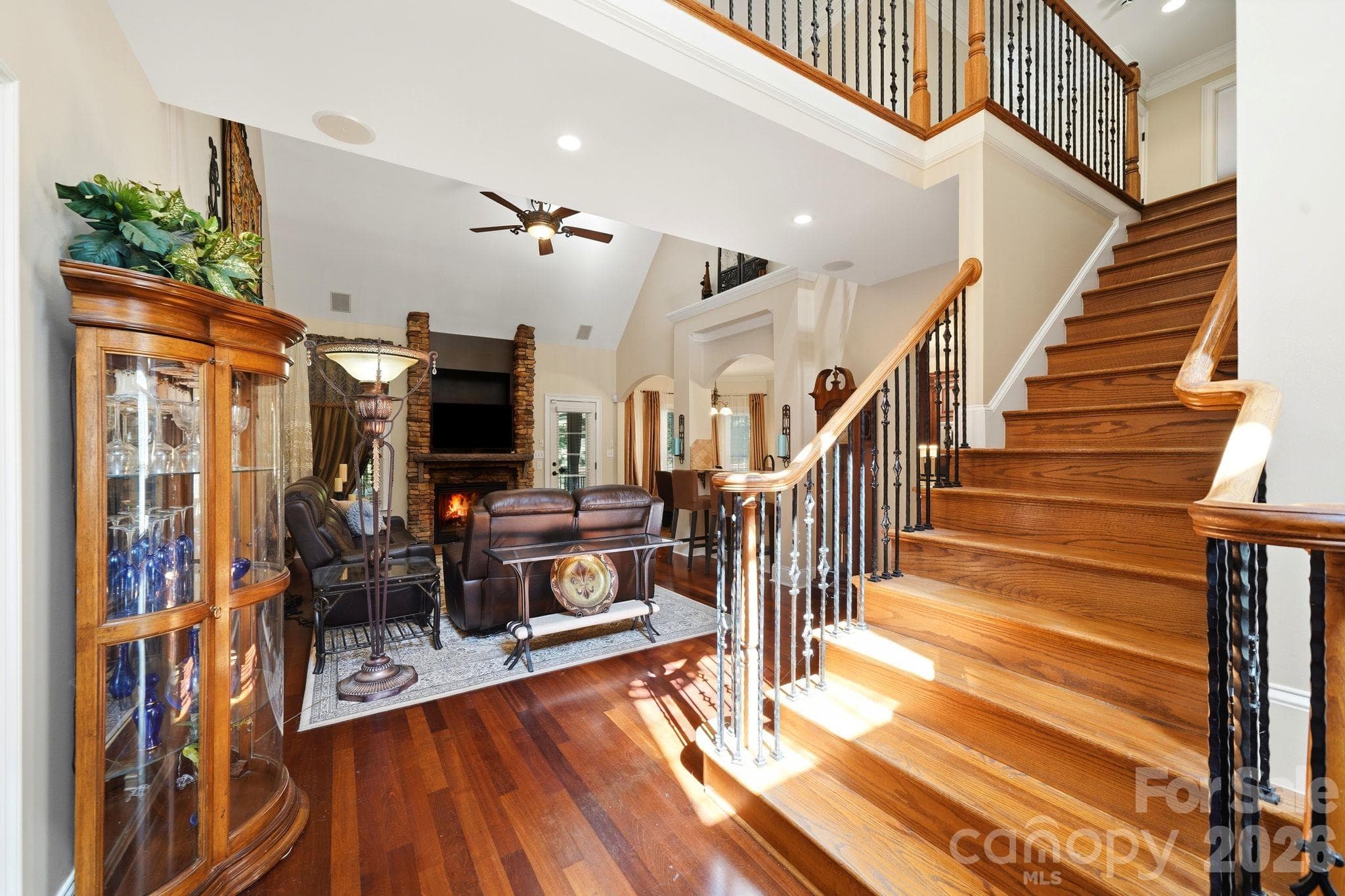 View of great room and grand staircase from entryway - 4585 Webbs Chapel Church Drive, Denver