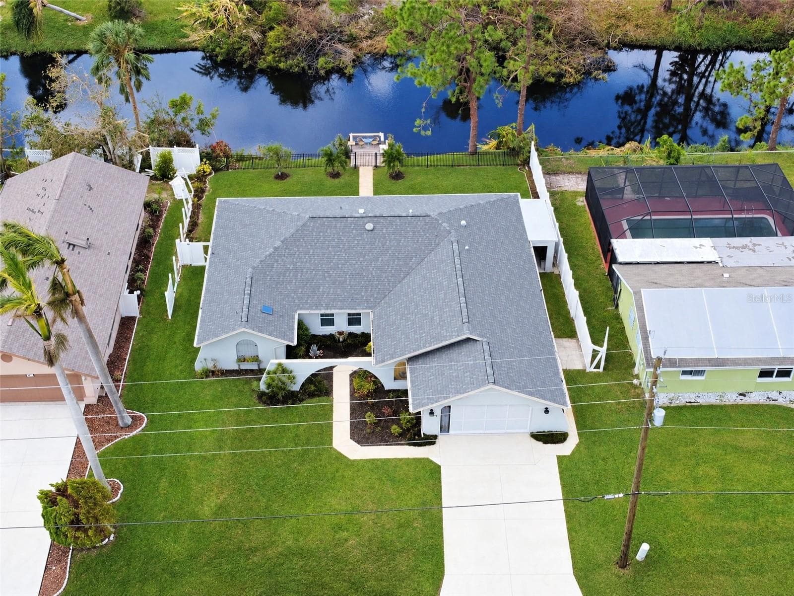 Aerial View - Home and Canal - 3065 CLIFFORD ST, PUNTA GORDA