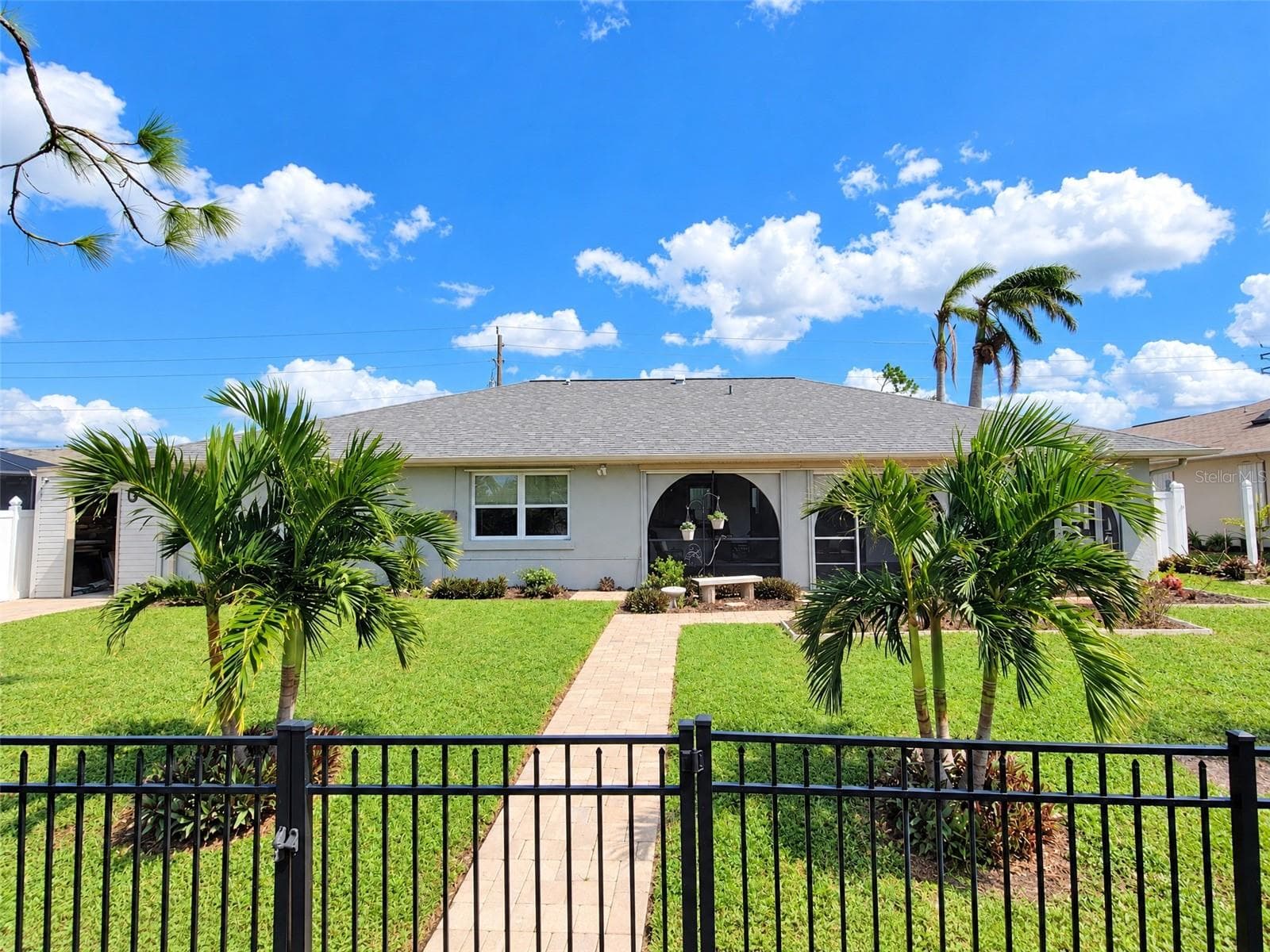 Rear Exterior and Fenced Yard - 3065 CLIFFORD ST, PUNTA GORDA